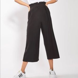 Topshop ruffle waist black cropped trousers